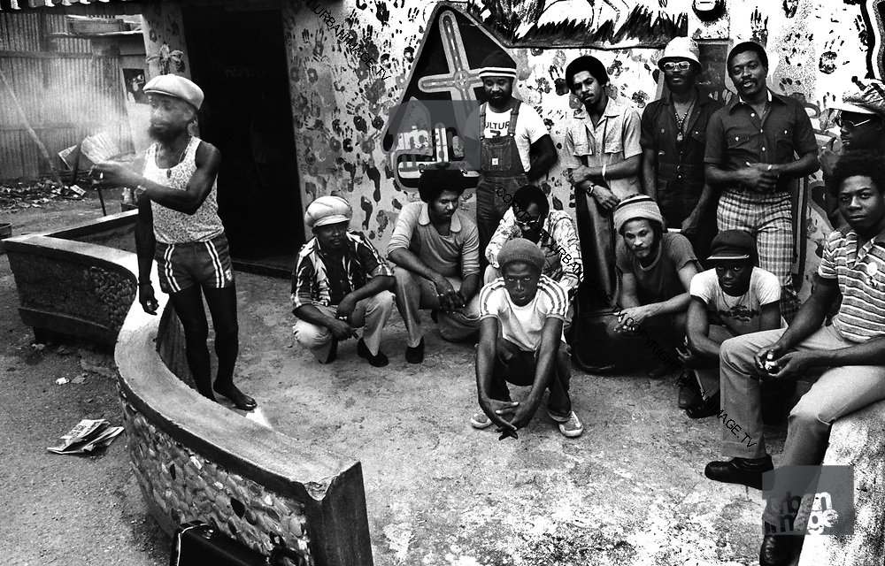 Musicians and visitors gathered in the courtyard at Lee Perry’s Black Ark studio.