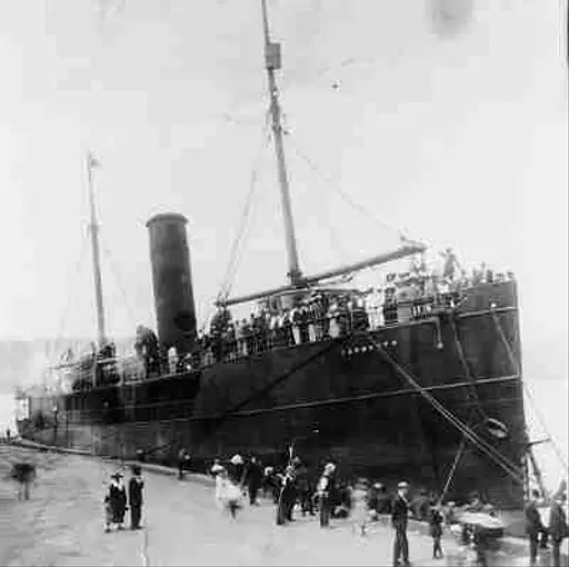 Historic photograph of a Black Star Line ship at dock.