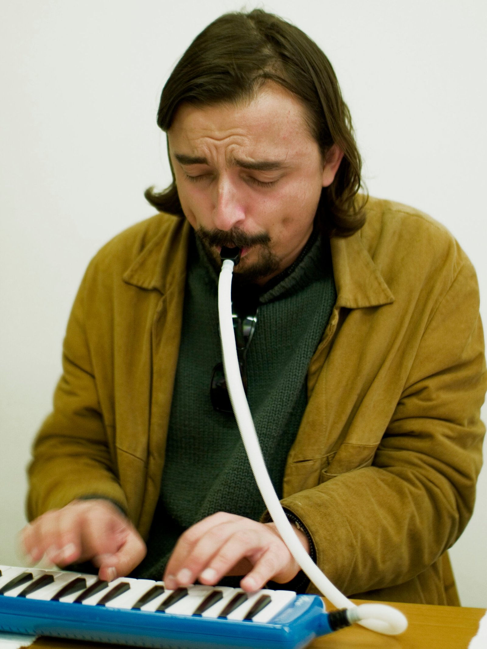 A melodica with a flexible mouth tube