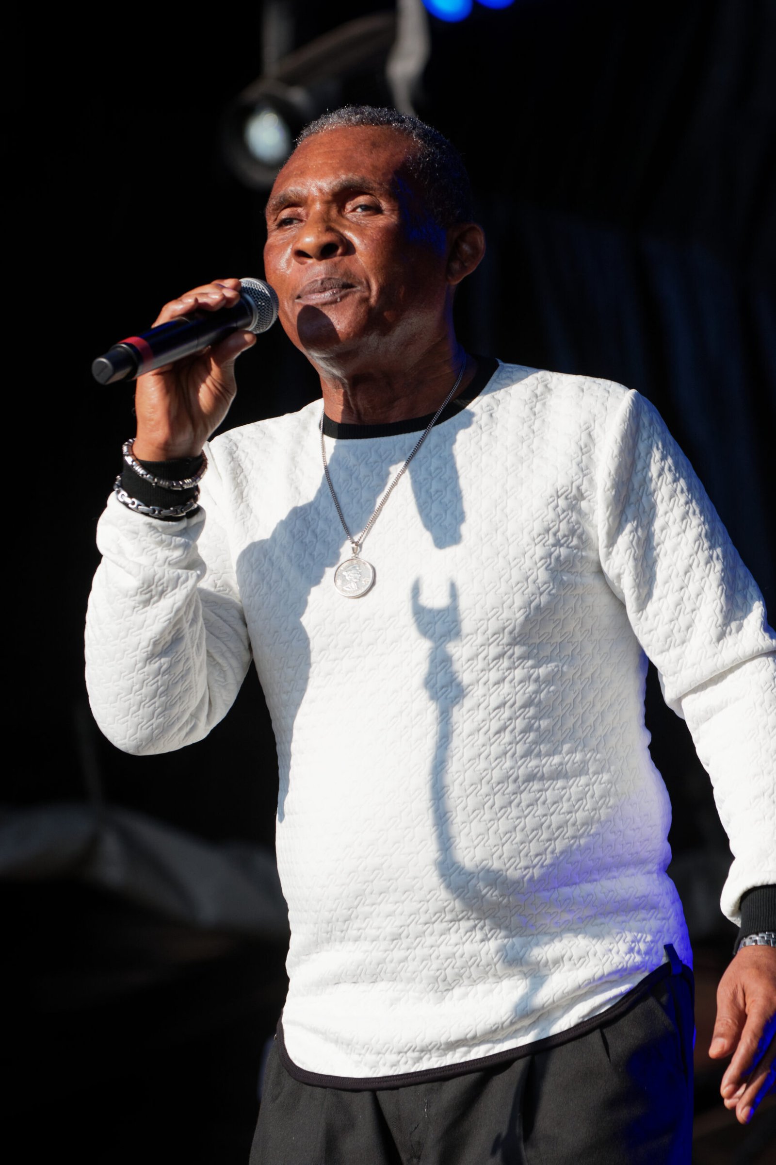 Ken Boothe performing onstage in 2018