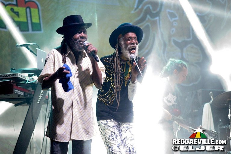 U-Roy performing with a microphone at Rototom Sunsplash in 2017